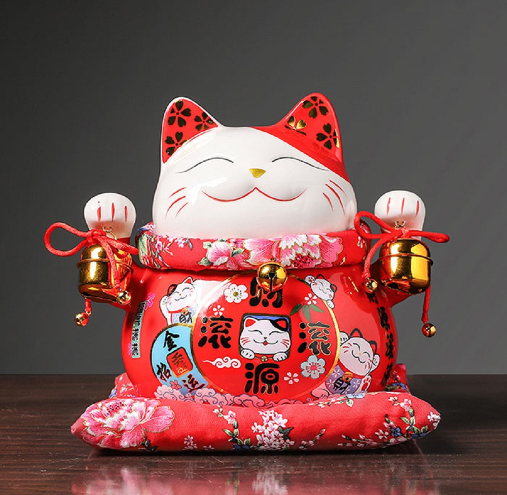 Trong tiếng Nhật, Mèo Thần Tài có tên gọi là Maneki neko
